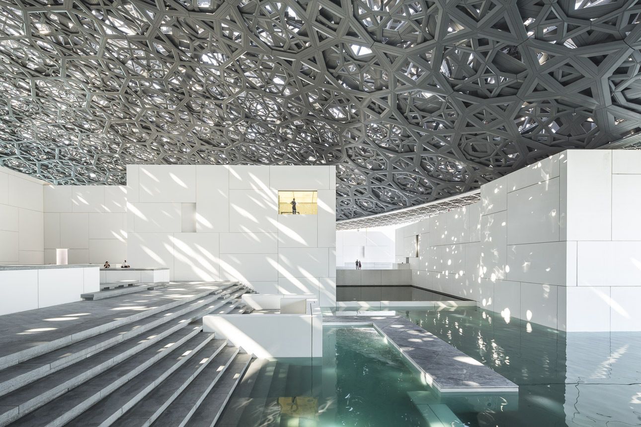 Interior of Louvre Abu Dhabi beneath the rain of light dome